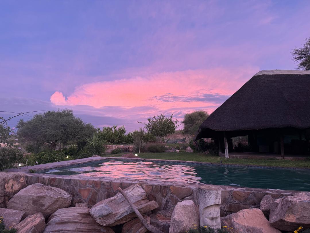 Swimming pool and surrounding landscape